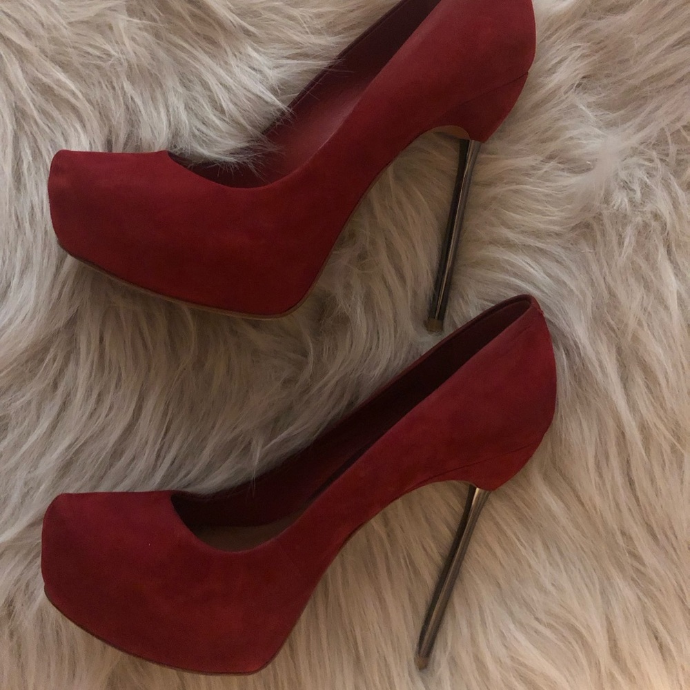 37 Red Aldo platform pumps with metal heel.